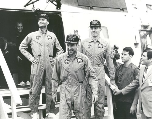 The crew on board the USS Iwo Jima following splashdown.