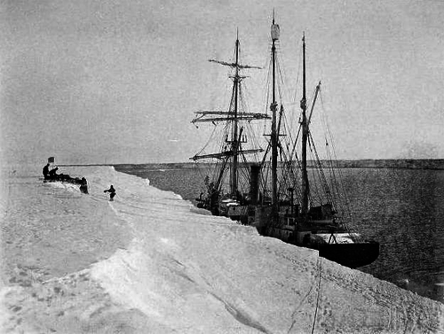 Shackleton and his crew, with The Nimrod, docked in Antarctica.	 
