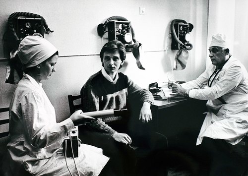 A worker receiving a medical examination after the explosion. 